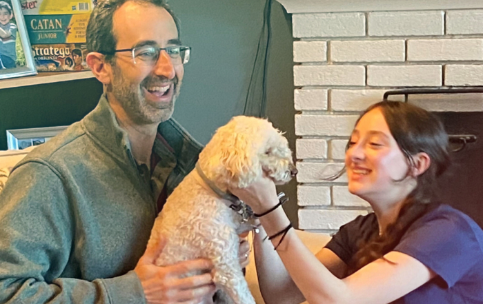 Jeff Wexler with his daughter and his dog.