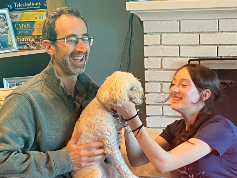 Jeff Wexler with his daughter and his dog.